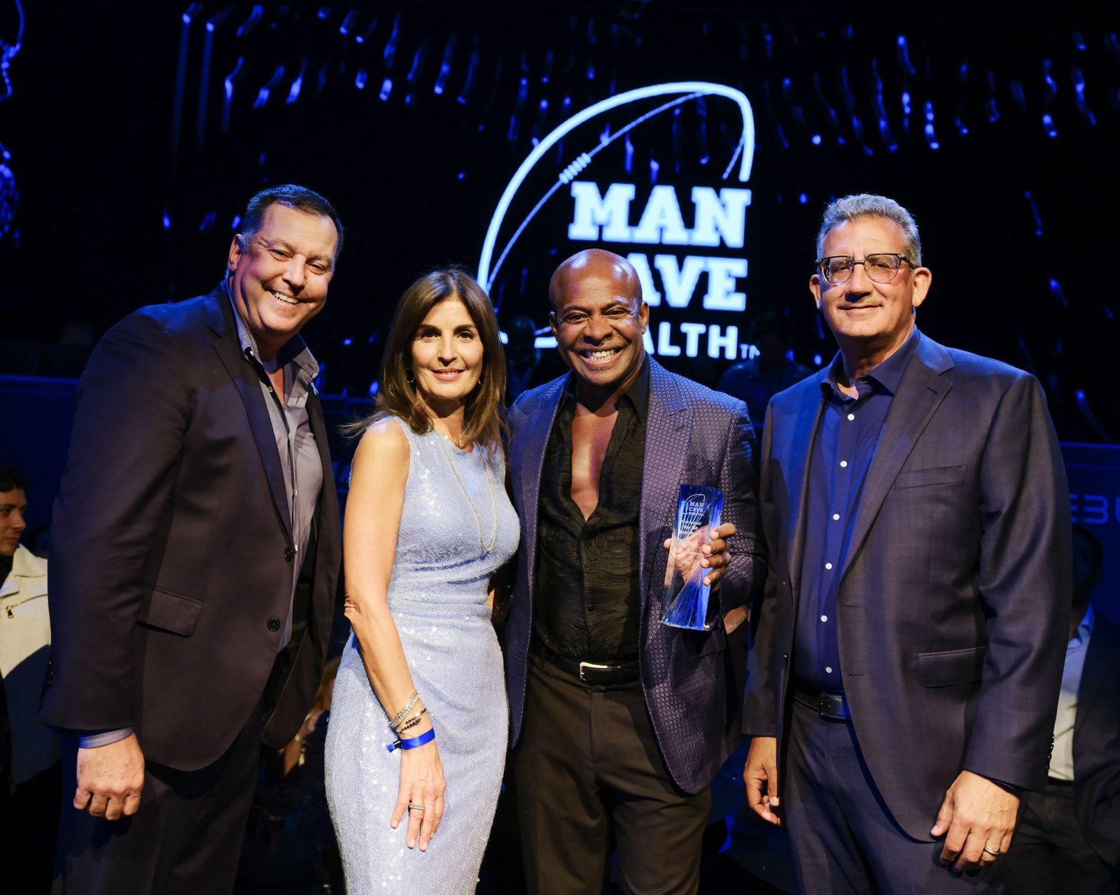 Frederick Anderson receives the inaugural Blue Ball Impact Award from Man Cave Health